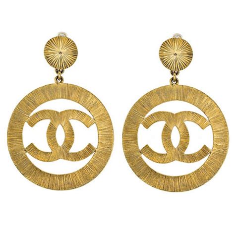 chanel gold cc dangle piercing earrings|Chanel earrings letters price.